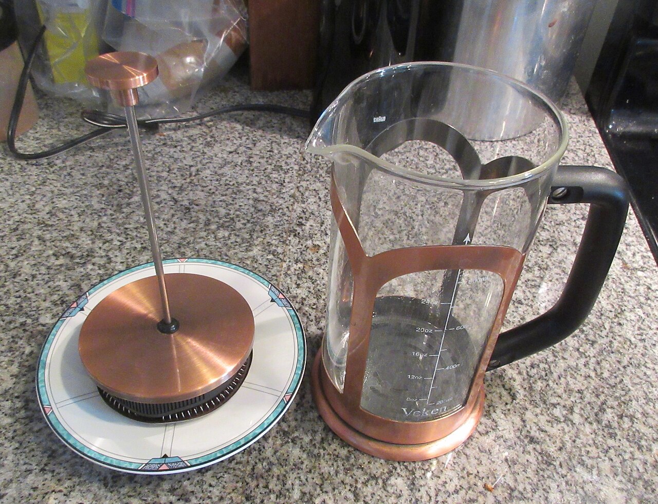Simple budget coffee setup with French press, kettle, and grinder